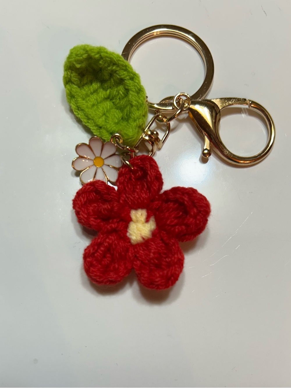 Handcrafted Red Crochet Flower Keychain with Green Leaf